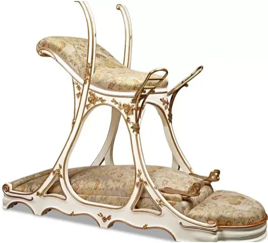 A chair designed to facilitate threesomes exhibited in the Sex Machines Museum in Prague